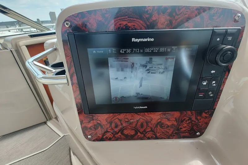 Slide: The Image of Raymarine navigation display on 2000 Sea Ray Sundancer 400 yacht dashboard. - 17