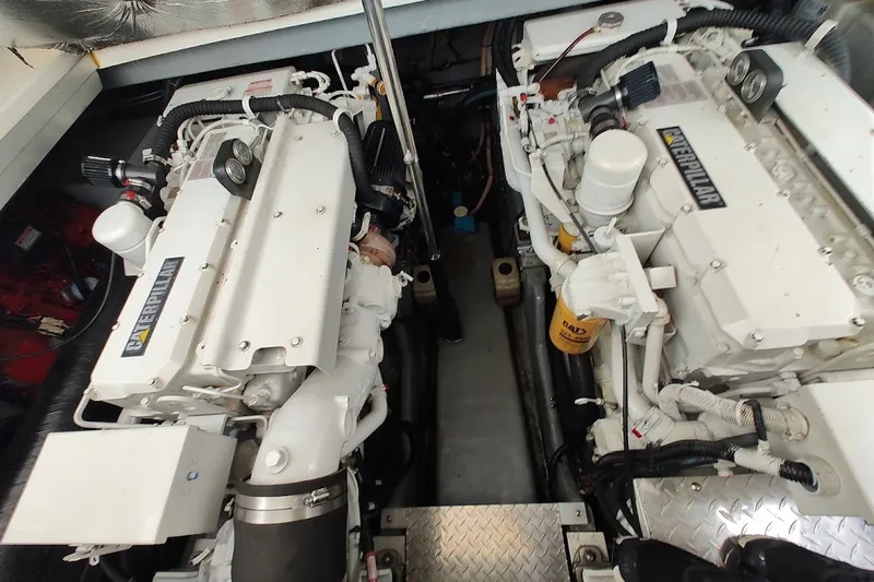 Slide: The Image of Engine room of a 2000 Sea Ray Sundancer 400 with twin Caterpillar engines. - 30