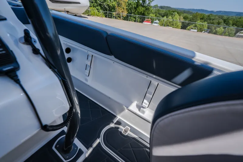 Slide: The Image of Interior view of a 2019 Concept 36' Cuddy Cabin boat, featuring sleek seating and modern design. - 32