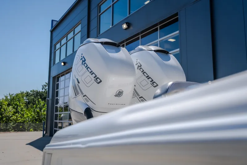 Slide: The Image of 2019 Concept 36' Cuddy Cabin with powerful outboard engines near modern building. - 13