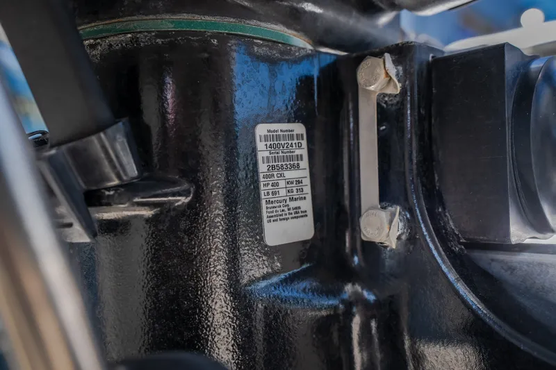 Slide: The Image of Close-up of a 2019 Concept 36' Cuddy Cabin engine label and components. - 22