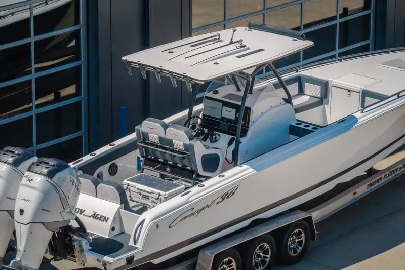 Slide: The Image of 2019 Concept 36' Cuddy Cabin boat with dual engines, sleek design, and modern features. - 56