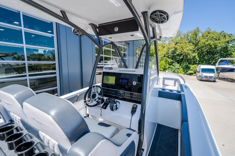 Slide: The Image of 2019 Concept 36' Cuddy Cabin boat interior with modern controls and seating. - 28