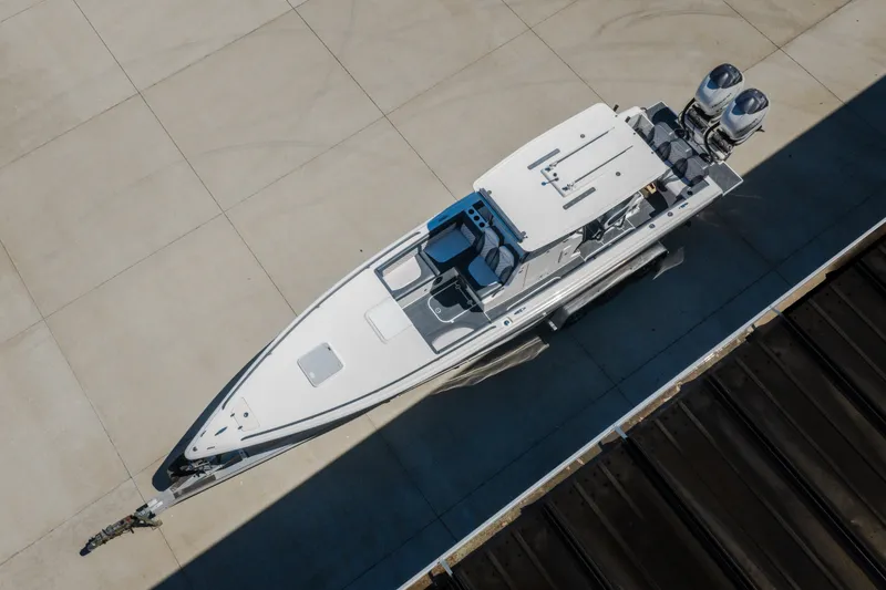 Slide: The Image of Overhead view of 2019 Concept 36' Cuddy Cabin boat on trailer. - 53