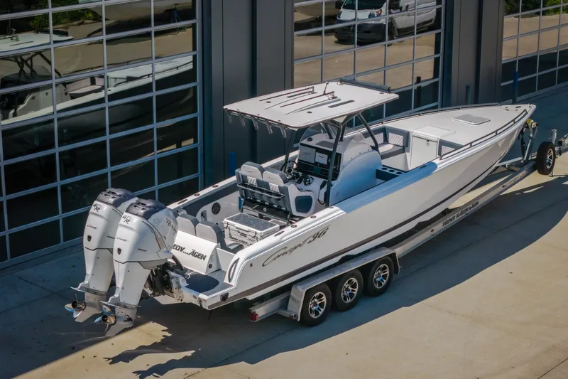 Slide: The Image of 2019 Concept 36' Cuddy Cabin boat with dual engines on a trailer. - 16