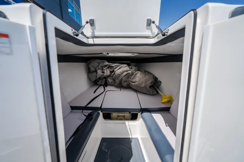 Slide: The Image of Interior of 2019 Concept 36' Cuddy Cabin boat with seating and storage. - 36