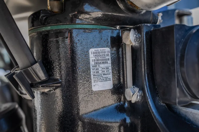 Slide: The Image of Close-up of a 2019 Concept 36' Cuddy Cabin engine component with Mercury Marine label. - 21