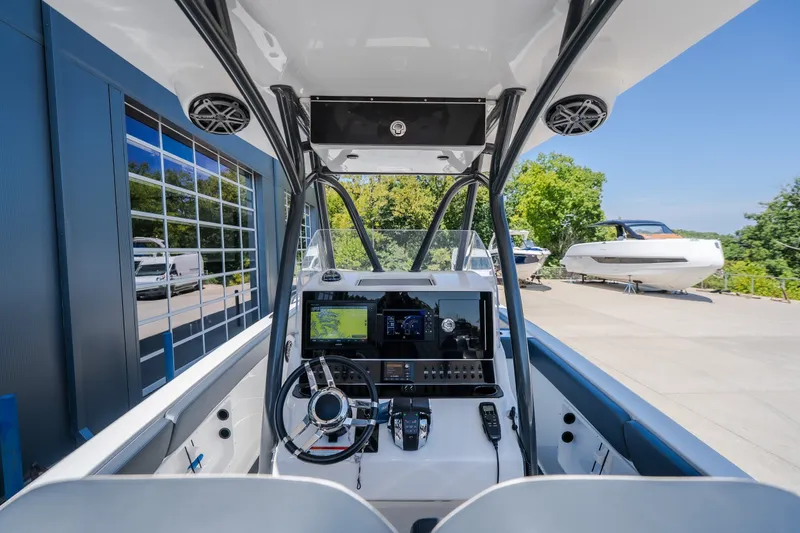 Slide: The Image of Interior view of 2019 Concept 36' Cuddy Cabin boat with modern navigation equipment. - 27