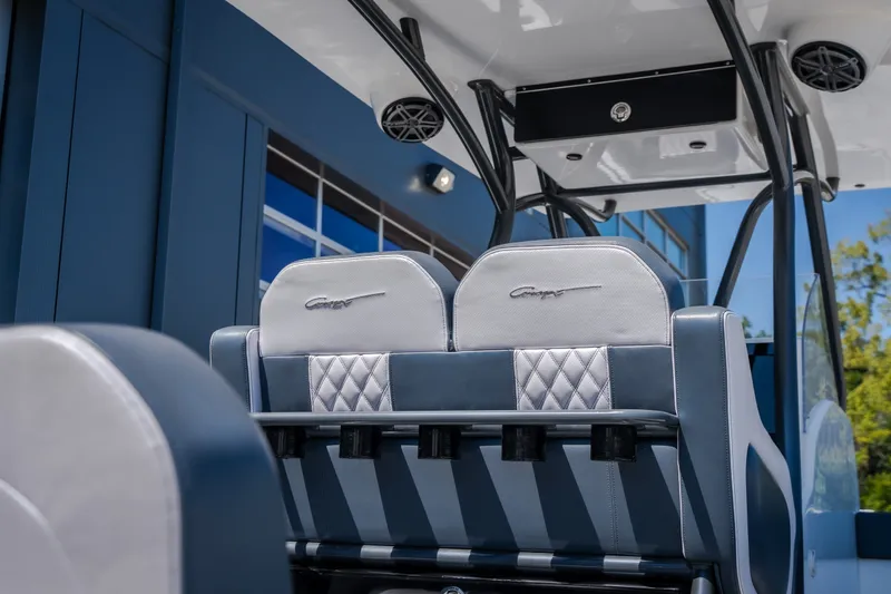 Slide: The Image of Luxury seating on 2019 Concept 36' Cuddy Cabin boat, featuring elegant design and craftsmanship. - 9