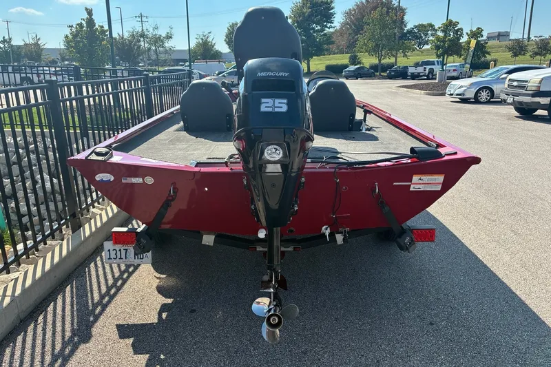 Slide: The Image of 2019 Lowe Stinger 175C boat with Mercury 25 engine in parking lot. - 3