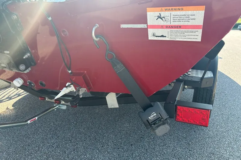 Slide: The Image of Rear view of a 2019 Lowe Stinger 175C boat with safety warnings visible. - 5