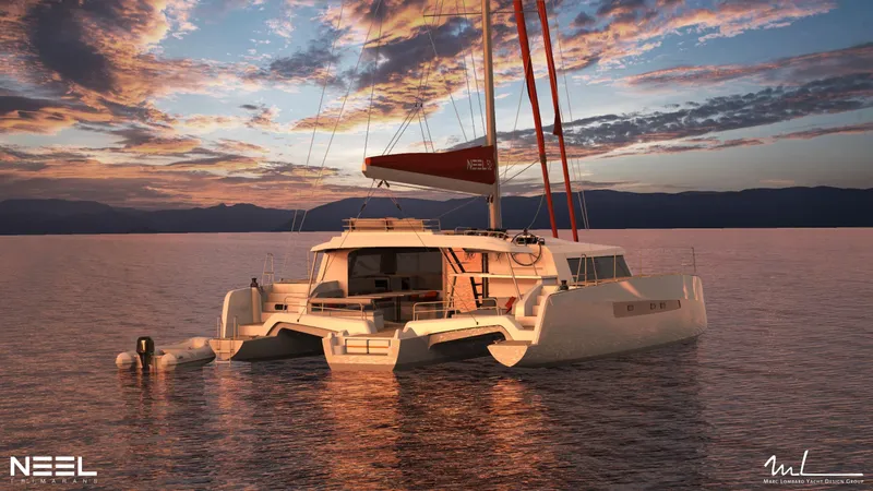 Slide: The Image of Sleek NEEL 52 trimaran sailing at sunset, 2025 model, on calm waters. - 21