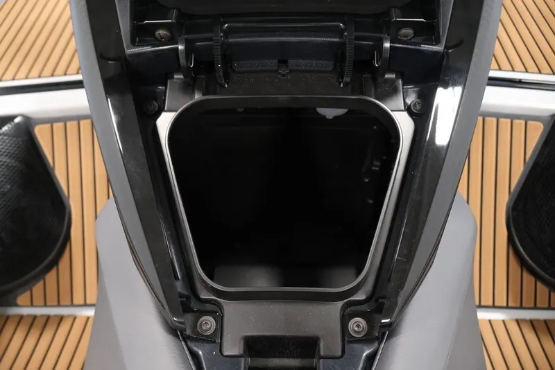 Slide: The Image of 2027 Yamaha WaveRunner Crosswave storage compartment, open on teak deck. - 26