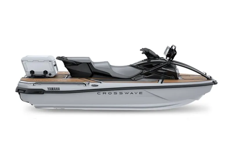 Slide: The Image of 2027 Yamaha WaveRunner Crosswave jet ski, sleek design, side view, white and black color scheme. - 2