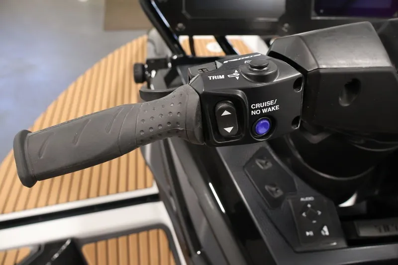 Slide: The Image of Close-up of 2027 Yamaha WaveRunner Crosswave handlebar controls with cruise and trim features. - 15