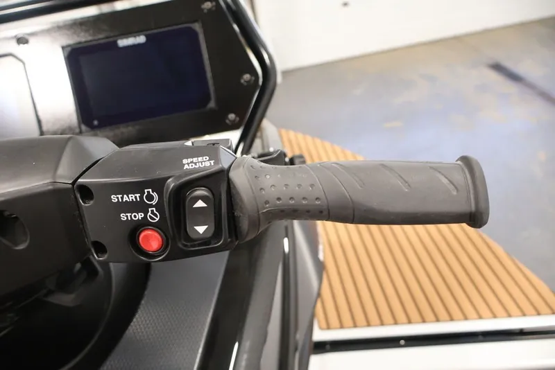 Slide: The Image of Handlebar controls of 2027 Yamaha WaveRunner Crosswave with start, stop, and speed adjust buttons. - 7