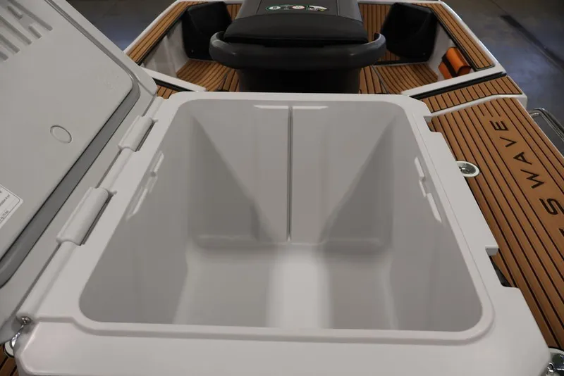 Slide: The Image of Open storage compartment on 2027 Yamaha WaveRunner Crosswave, featuring sleek design and functionality. - 25