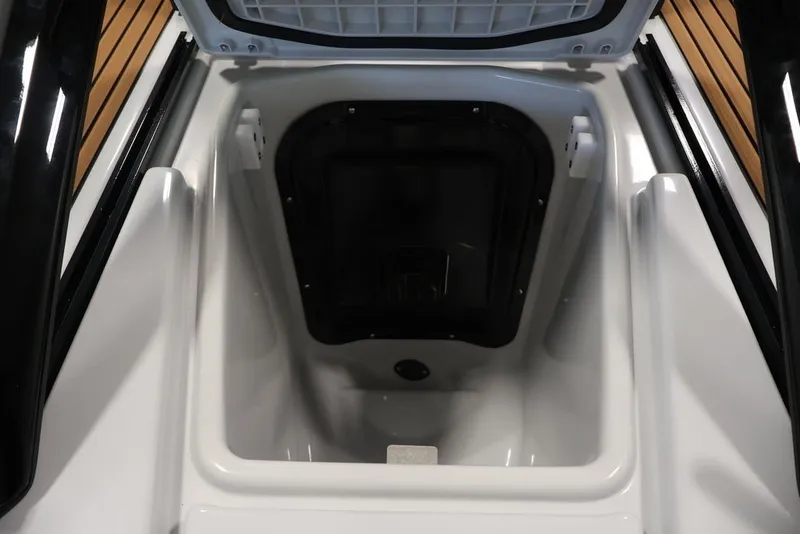 Slide: The Image of Open storage compartment of 2027 Yamaha WaveRunner Crosswave, showcasing interior space. - 18