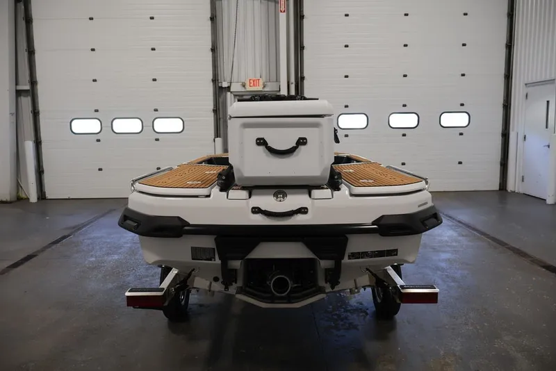 Slide: The Image of 2027 Yamaha WaveRunner Crosswave in garage, rear view with wooden deck accents. - 30