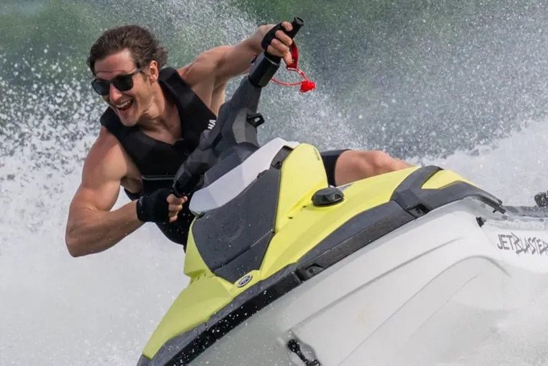Slide: The Image of Man riding 2027 Yamaha WaveRunner JetBlaster on water, showcasing speed and excitement. - 4