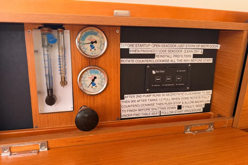 Slide: The Image of Control panel of a 2014 Jeanneau Sun Odyssey 509 sailboat with gauges and instructions. - 106