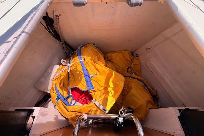 Slide: The Image of Yellow bags stored in the Jeanneau Sun Odyssey 509 sailboat compartment, 2014 model. - 36