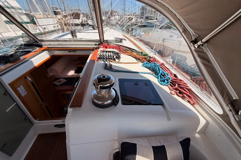 Slide: The Image of Cockpit view of 2014 Jeanneau Sun Odyssey 509 sailboat with ropes and winch. - 48