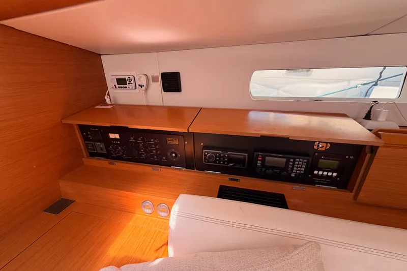 Slide: The Image of Interior control panel of 2014 Jeanneau Sun Odyssey 509 yacht with wooden finish. - 73
