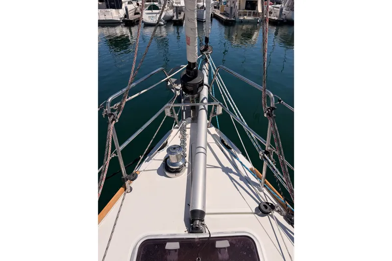 Slide: The Image of Bow view of 2014 Jeanneau Sun Odyssey 509 sailboat docked in marina. - 37