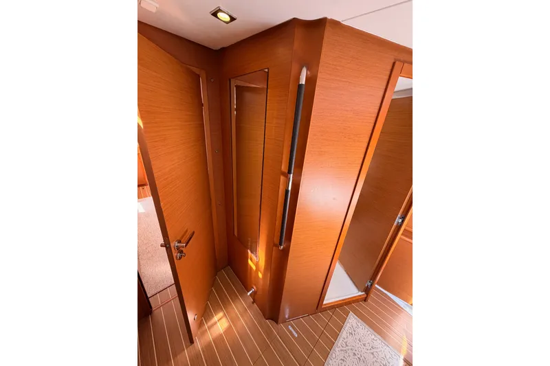 Slide: The Image of Interior of 2014 Jeanneau Sun Odyssey 509 yacht with wooden finish and modern design. - 94