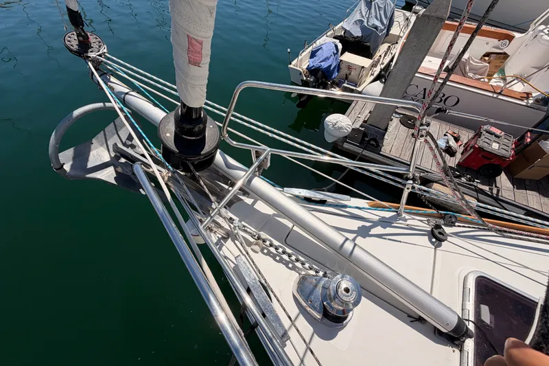 Slide: The Image of Bow of 2014 Jeanneau Sun Odyssey 509 sailboat docked at marina. - 38