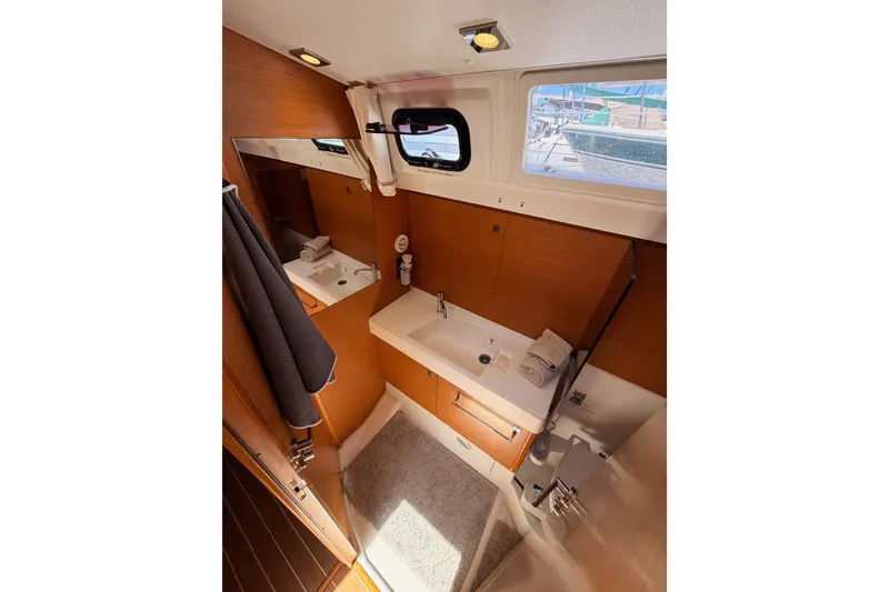 Slide: The Image of Luxurious bathroom interior of 2014 Jeanneau Sun Odyssey 509 yacht, featuring modern fixtures. - 61