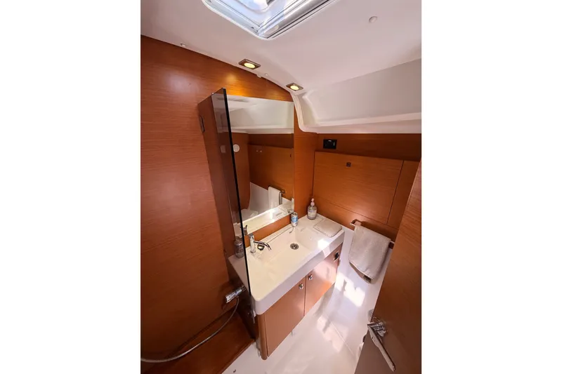 Slide: The Image of Luxurious bathroom interior of 2014 Jeanneau Sun Odyssey 509 yacht, featuring modern fixtures. - 90