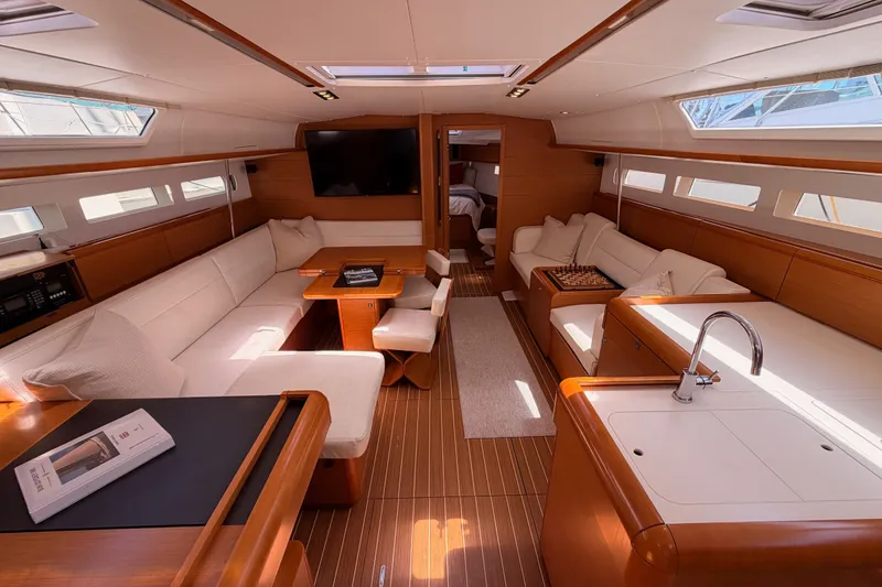Slide: The Image of Luxurious interior of 2014 Jeanneau Sun Odyssey 509 yacht with elegant seating and modern amenities. - 71