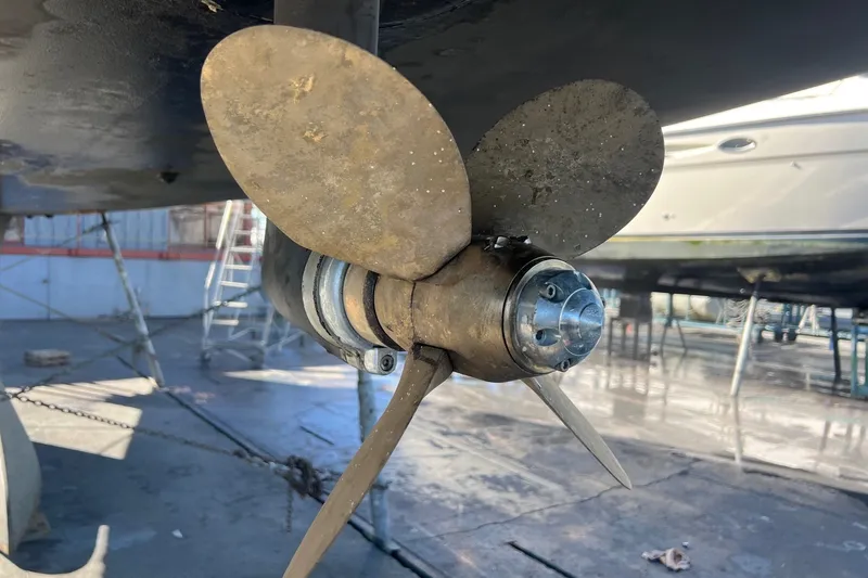 Slide: The Image of Propeller of 2014 Jeanneau Sun Odyssey 509 sailboat in dry dock. - 109