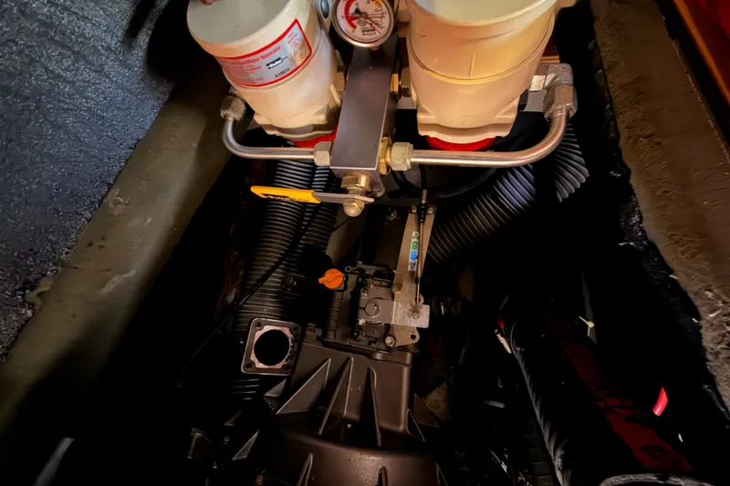 Slide: The Image of Engine compartment of a 2014 Jeanneau Sun Odyssey 509 sailboat, showcasing mechanical components. - 101