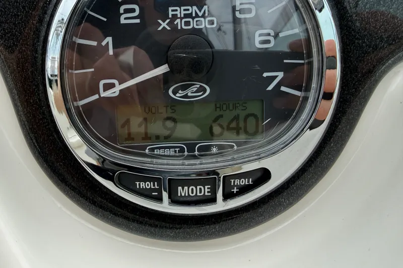 Slide: The Image of Close-up of a 2007 Sea Ray SLX 250 tachometer displaying 11.9 volts and 640 hours. - 19