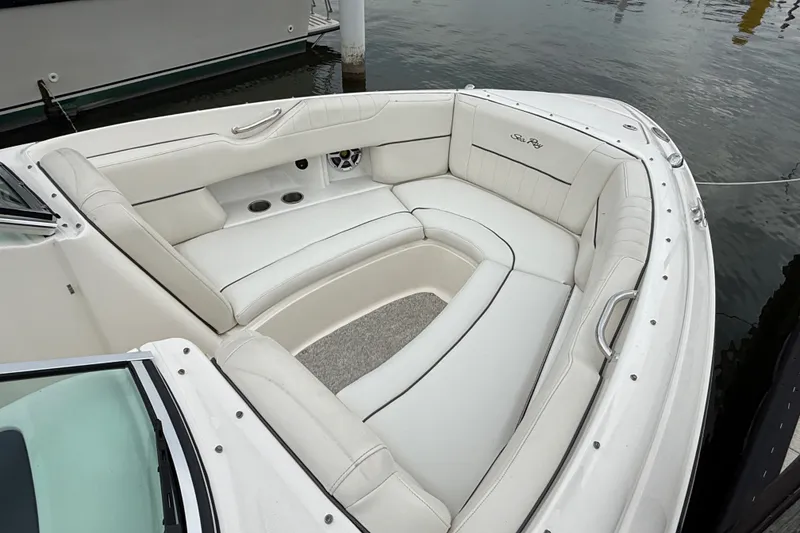 Slide: The Image of Luxurious 2007 Sea Ray SLX 250 boat interior with white leather seating. - 5