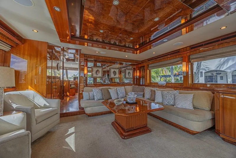Slide: The Image of Luxurious interior of 2010 Ocean Alexander 74 Motoryacht with elegant wood finishes and plush seating. - 27