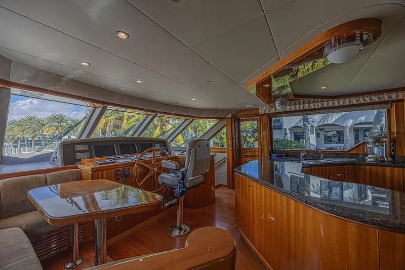 Slide: The Image of Luxurious interior of 2010 Ocean Alexander 74 Motoryacht with elegant wood finishes and panoramic windows. - 38