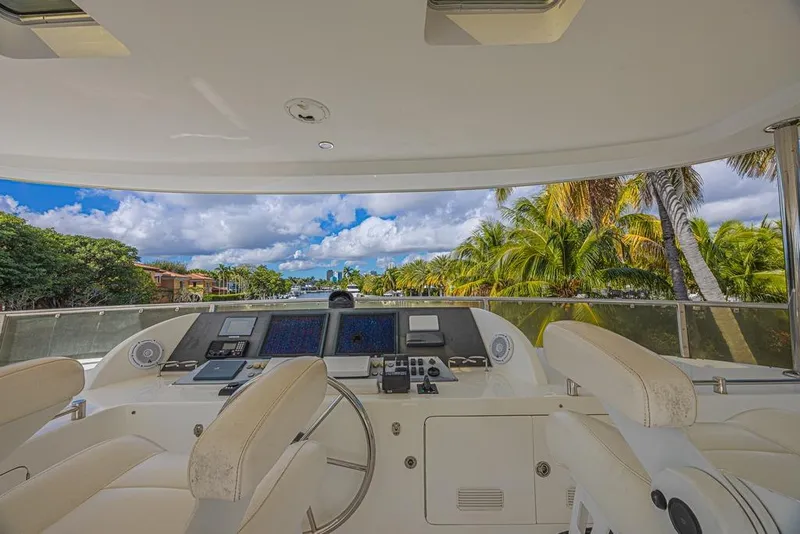 Slide: The Image of Cockpit view of 2010 Ocean Alexander 74 Motoryacht with tropical scenery. - 13
