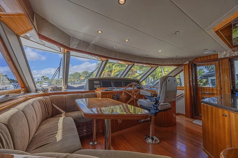 Slide: The Image of Luxurious interior of 2010 Ocean Alexander 74 Motoryacht with panoramic windows and elegant wood finishes. - 40