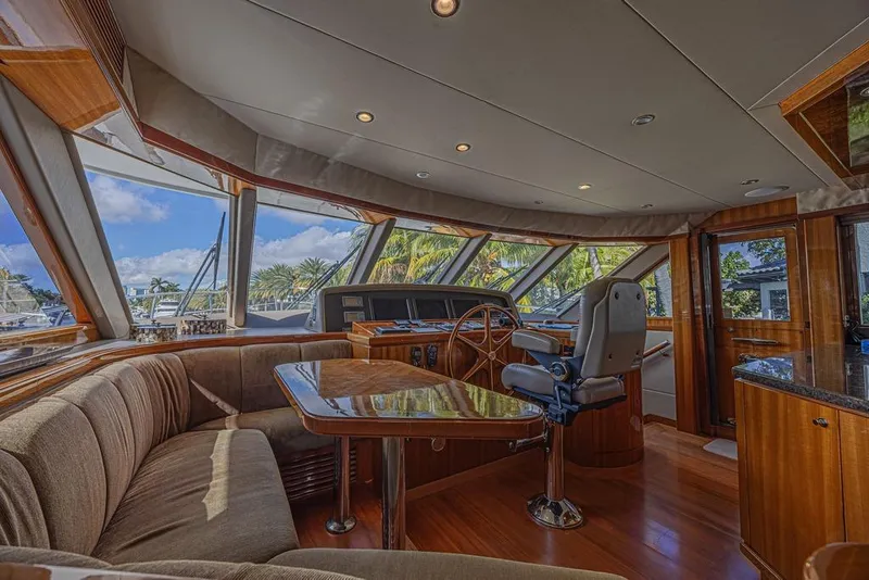 Slide: The Image of Luxurious interior of 2010 Ocean Alexander 74 Motoryacht with panoramic windows and elegant seating. - 41