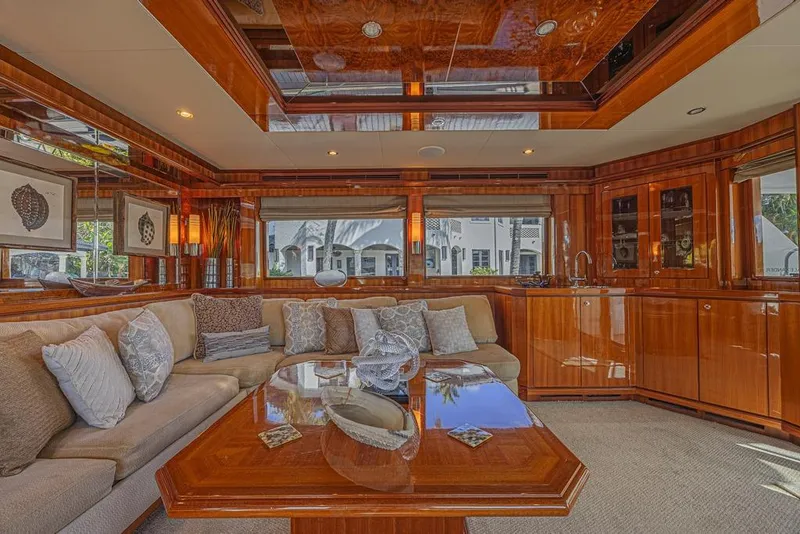 Slide: The Image of Luxurious interior of 2010 Ocean Alexander 74 Motoryacht with elegant wood finishes and plush seating. - 26