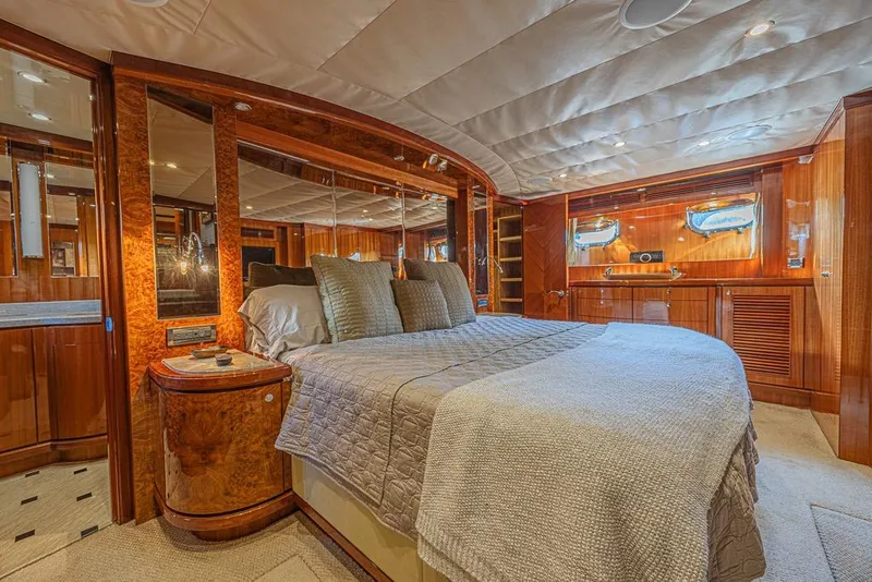 Slide: The Image of Luxurious bedroom interior of 2010 Ocean Alexander 74 Motoryacht with elegant wood finishes. - 50