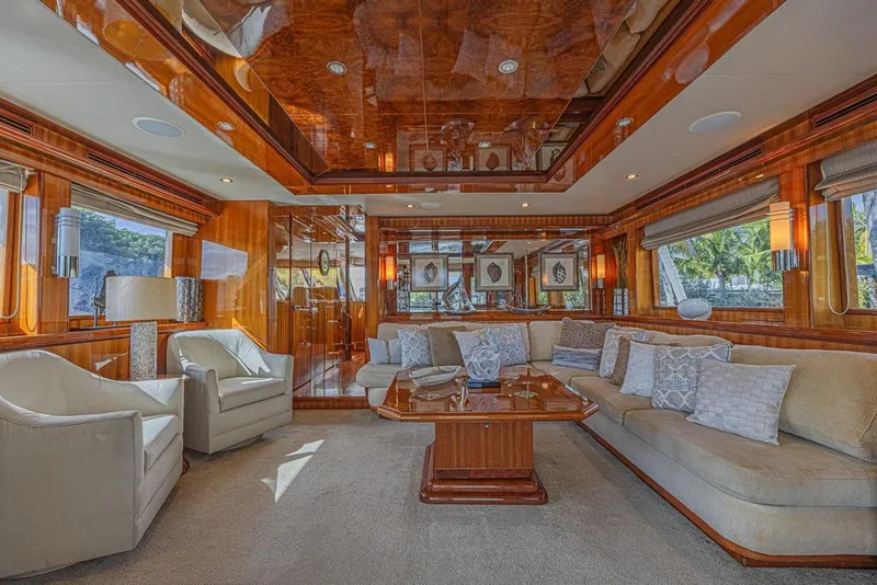 Slide: The Image of Luxurious interior of 2010 Ocean Alexander 74 Motoryacht with elegant wood finishes and plush seating. - 29