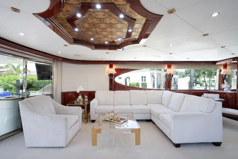 Slide: The Image of Luxurious interior of 2004 Lazzara 106 yacht with elegant white seating and ornate ceiling design. - 62
