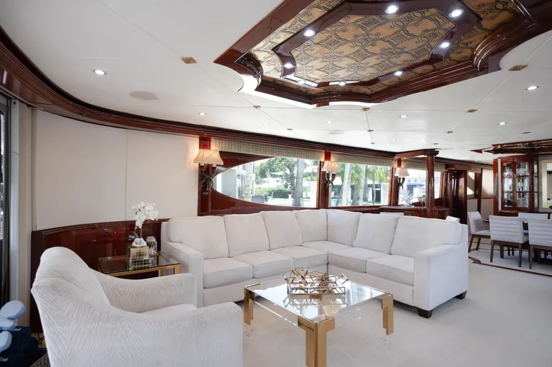 Slide: The Image of Luxurious interior of 2004 Lazzara 106 yacht with elegant white seating and ornate ceiling design. - 59