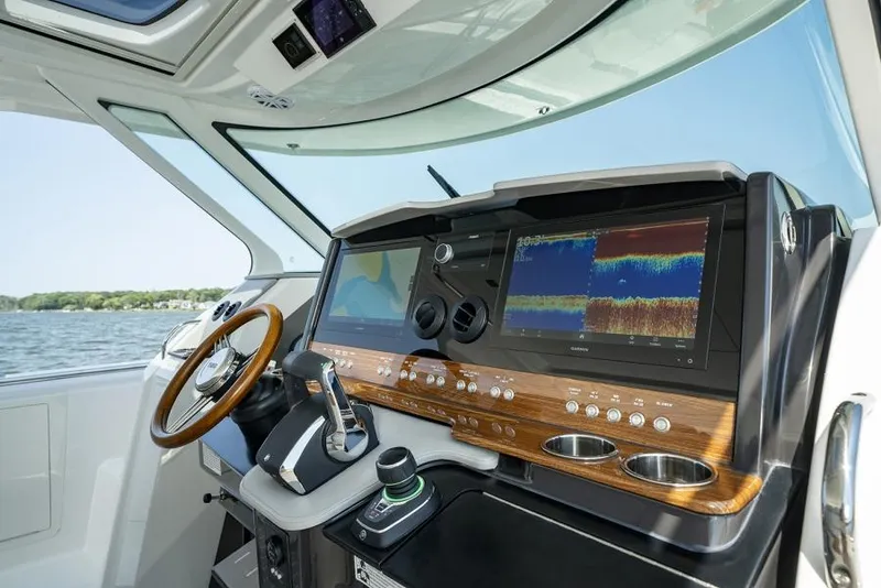 Slide: The Image of Manufacturer Provided Image: 2025 Tiara Yachts 43 LS helm with advanced navigation displays and controls. - 13