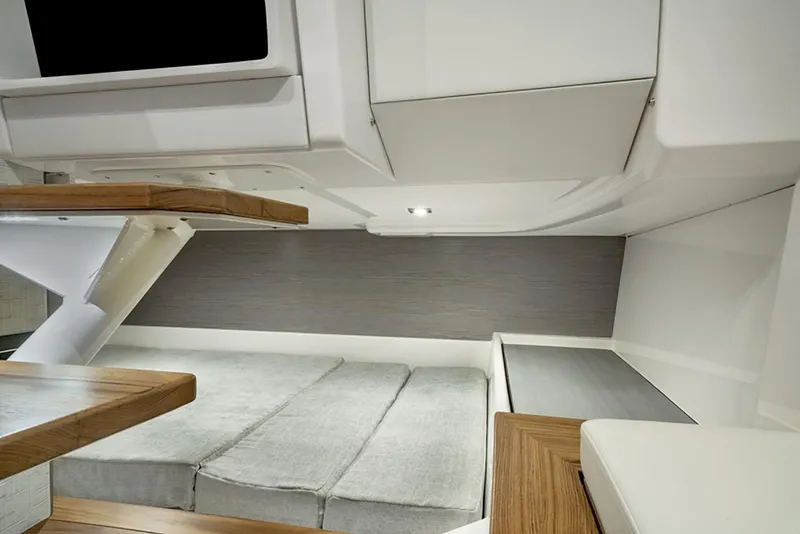 Slide: The Image of Manufacturer Provided Image: Interior cabin of 2025 Tiara Yachts 43 LS, featuring modern design and comfortable seating. - 25